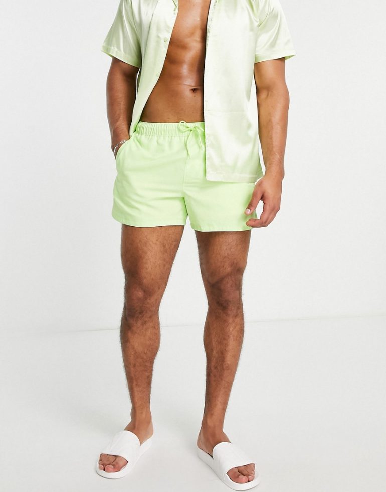 ASOS DESIGN swim shorts with pin tuck in light green short length